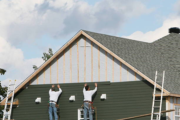 Professional Siding technician working in Andover, OH